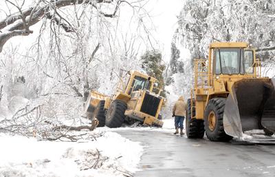 front loader gets stuck at Sikeston Mo pushing ice